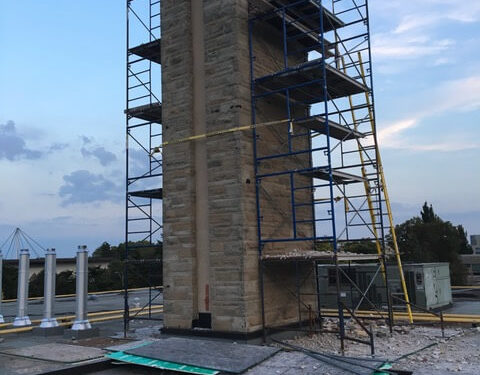 Chimney with scaffolding around it