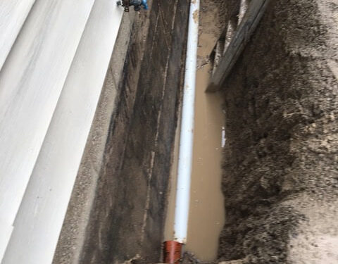 Heavy pooling of water along foundation