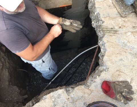 Basement wall being sealed